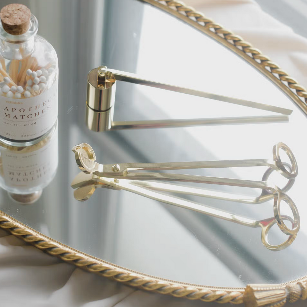 Gold Candle Snuffer - Shoppe Details and Design.