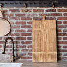 Antique Turkish cutting board with vintage charm, perfect for adding warmth to kitchens, tablescapes, backsplashes, and walls.