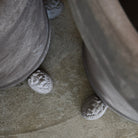 Bergs XL Potter ceramic planter with three lion head feet, designed in Denmark and handcrafted in Tuscany, outdoor-ready, durable, and stylish for gardens.