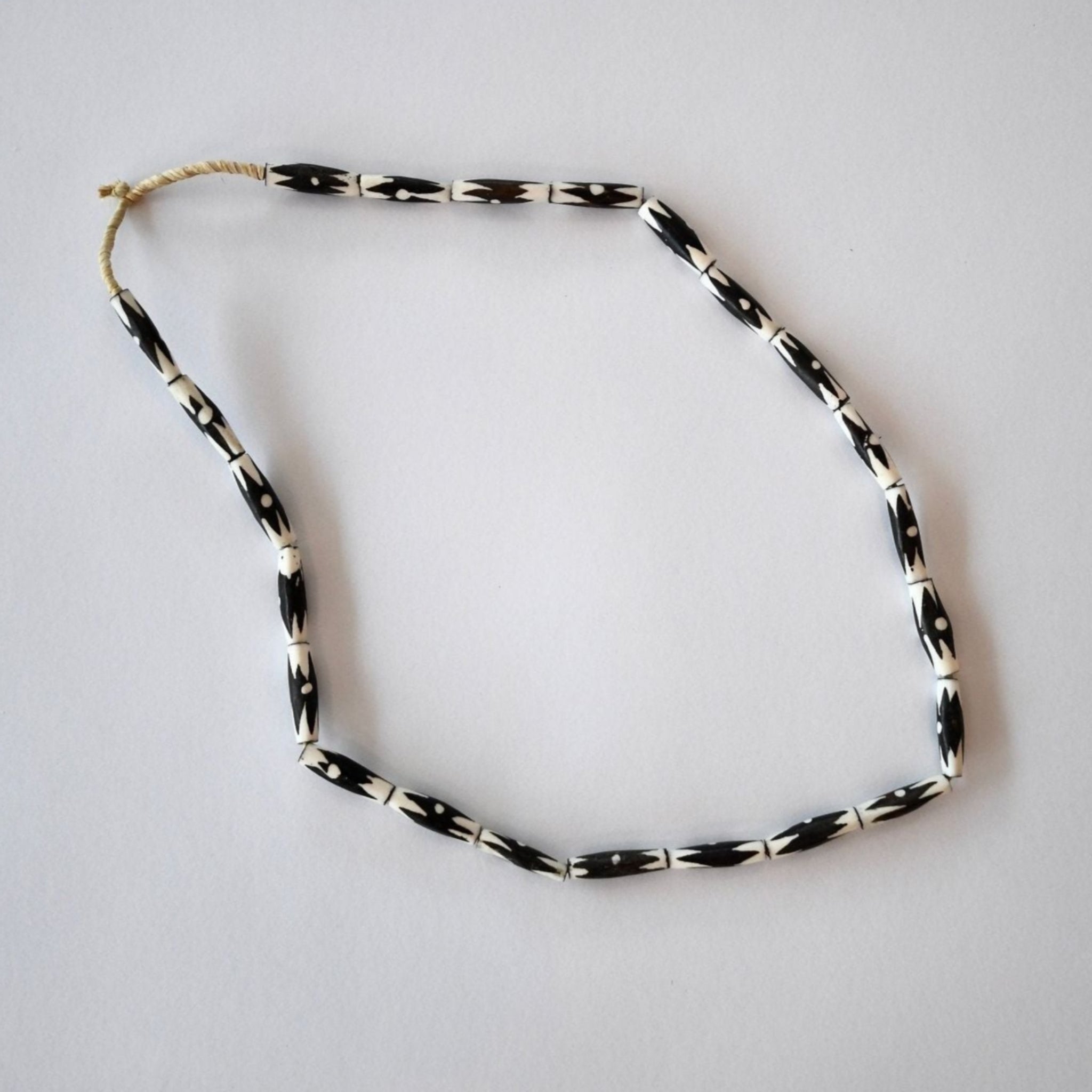 medium black and white bone beads