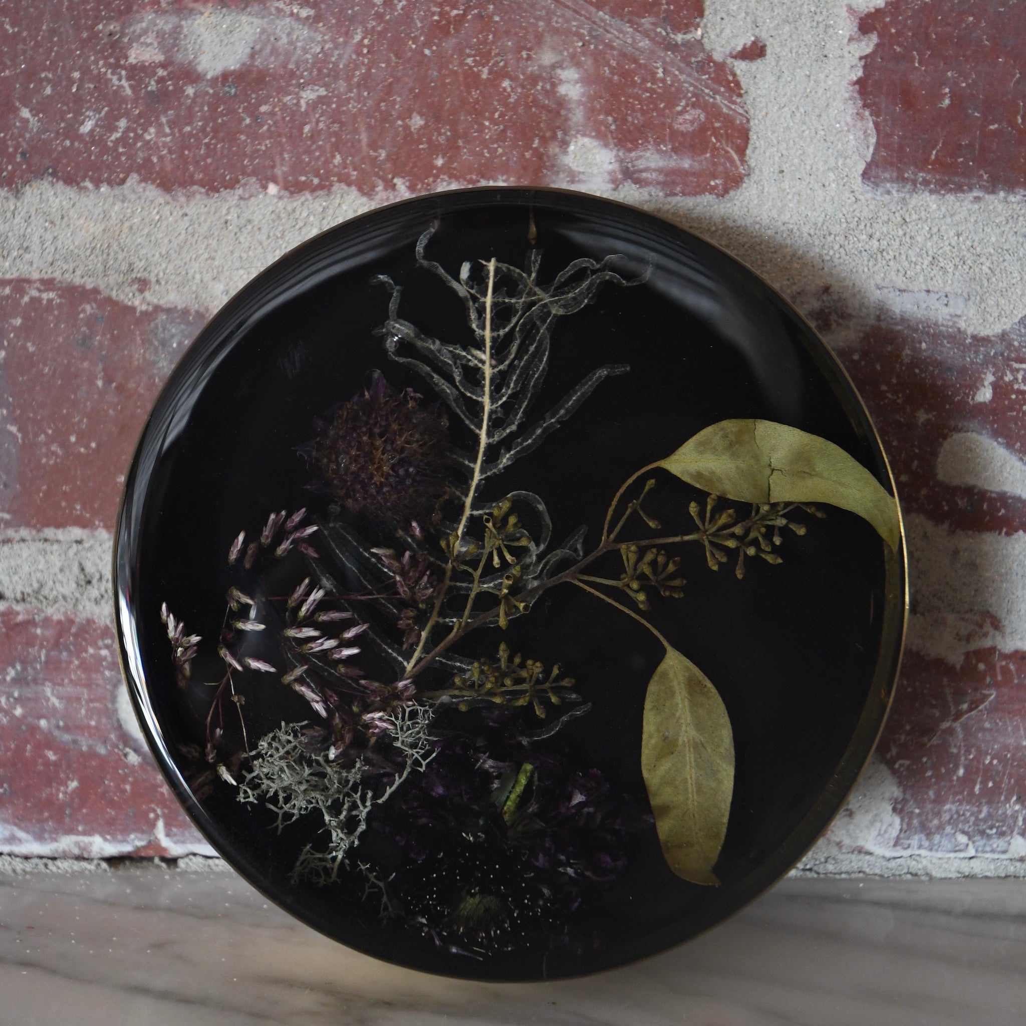 botanical resin art brass and black wall art.