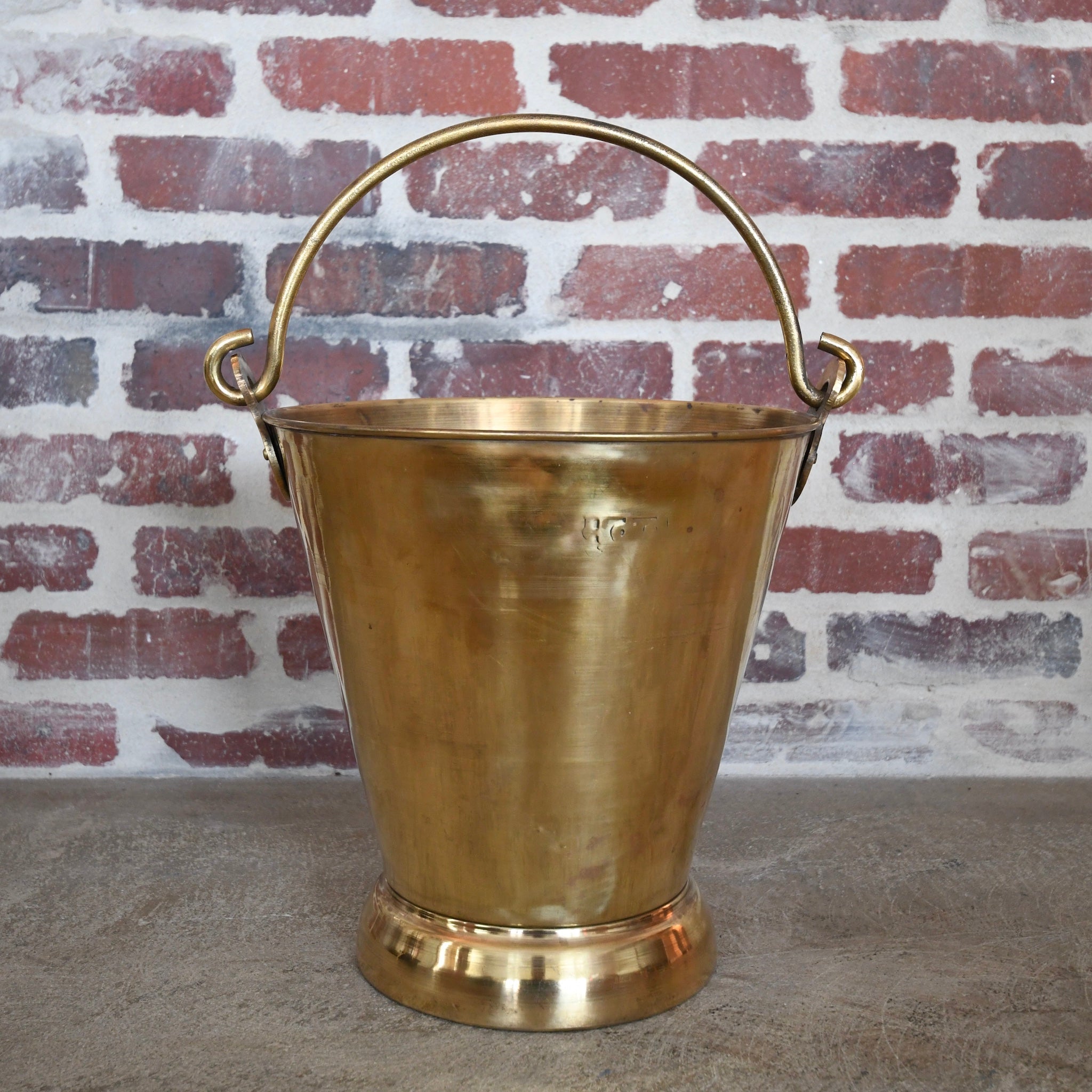 brass bucket with handle.