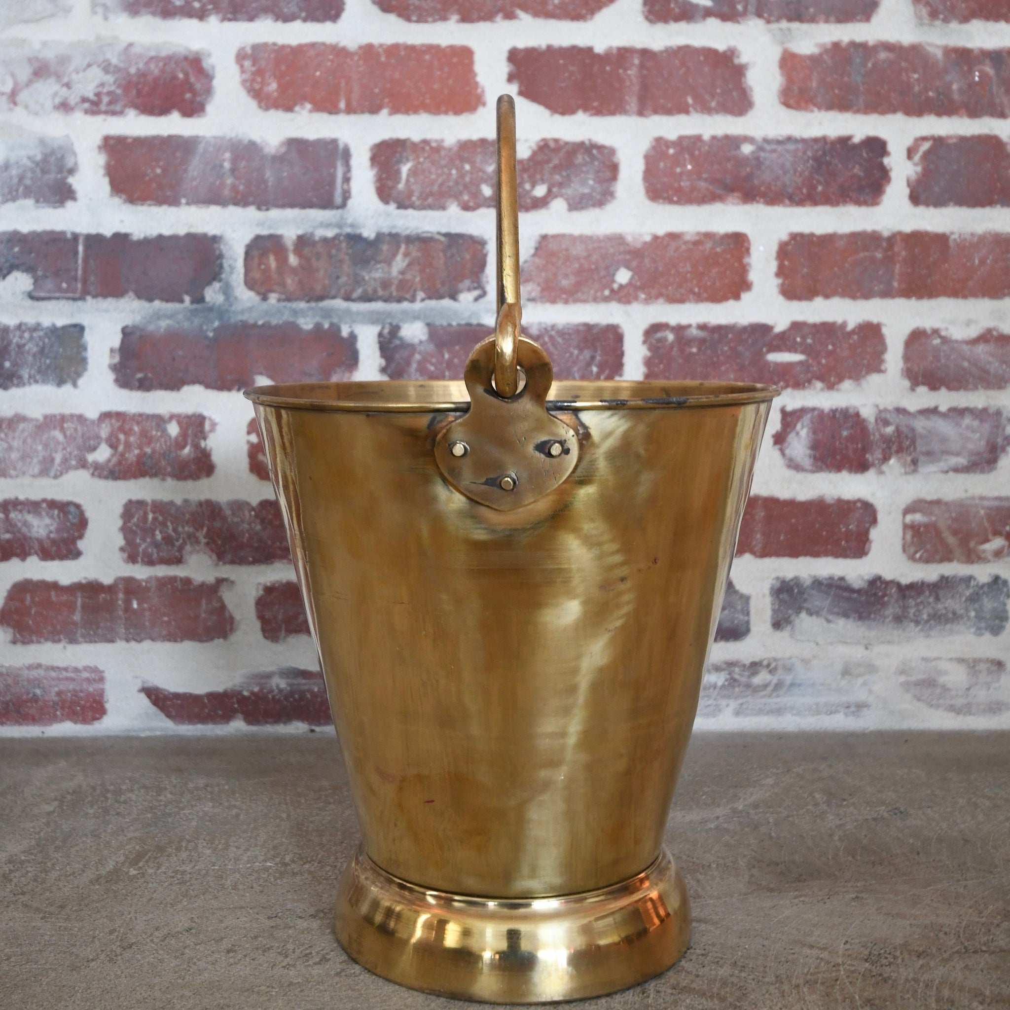 brass bucket with handle.