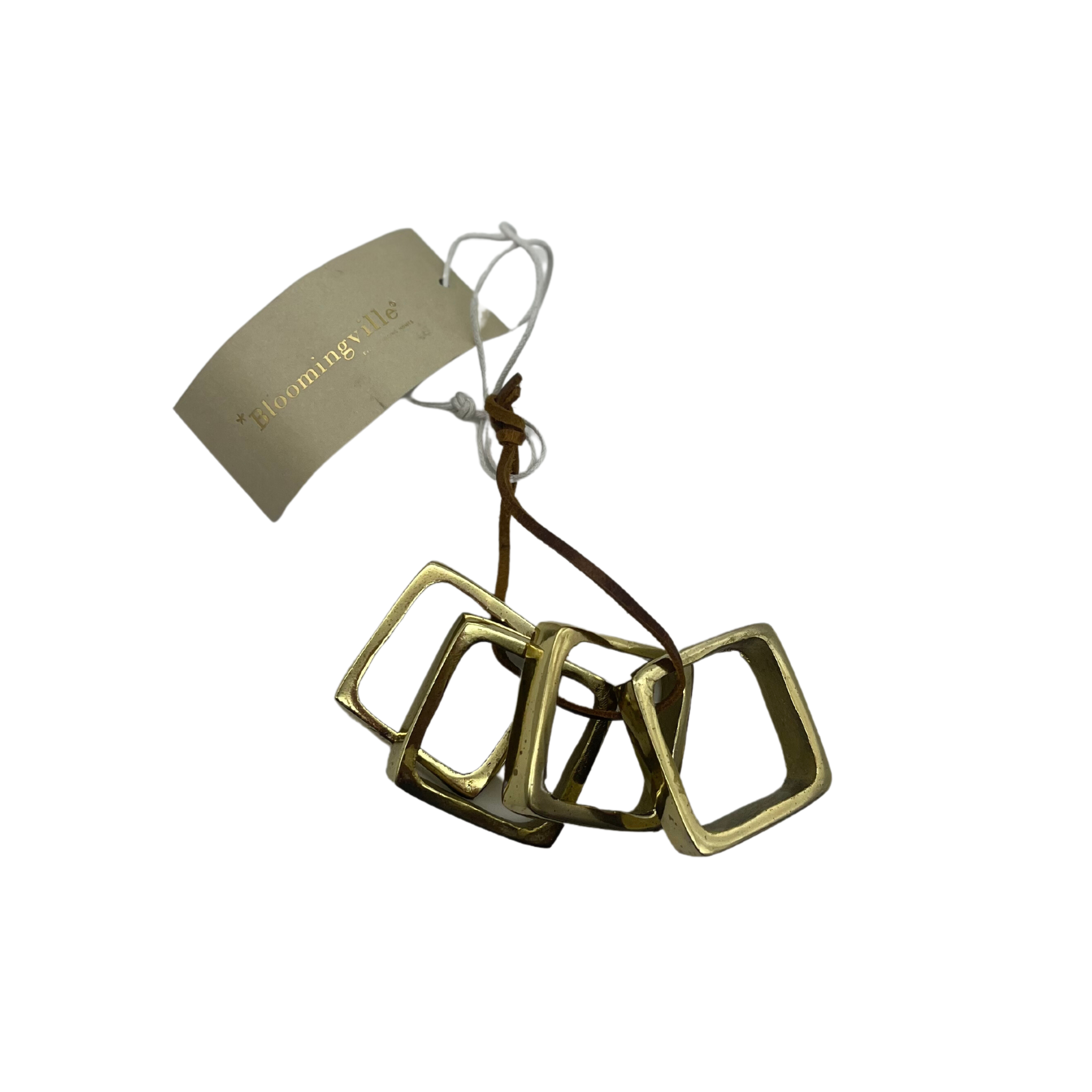 brass tone square napkin rings set of four.