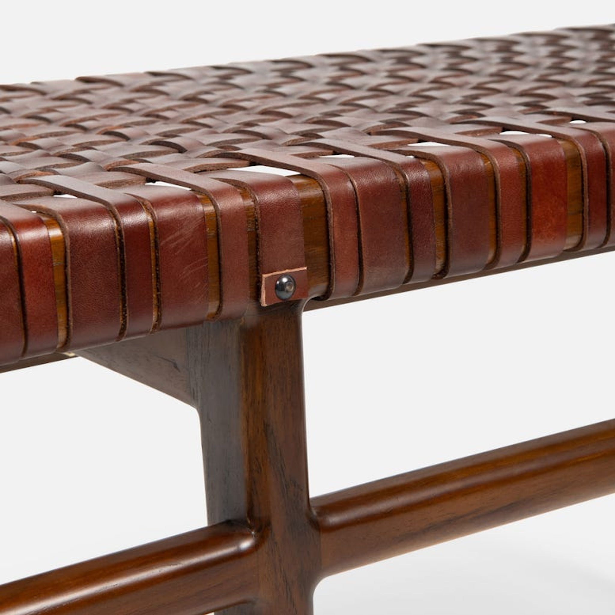 Chestnut woven leather bench.