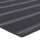 Navy with blue gray stripe rug, handwoven flatwoven PET yarns, featuring thin and thick stripes in navy and light blue, low 1/3" pile.