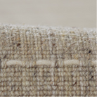 neutral rug with texture stripe.