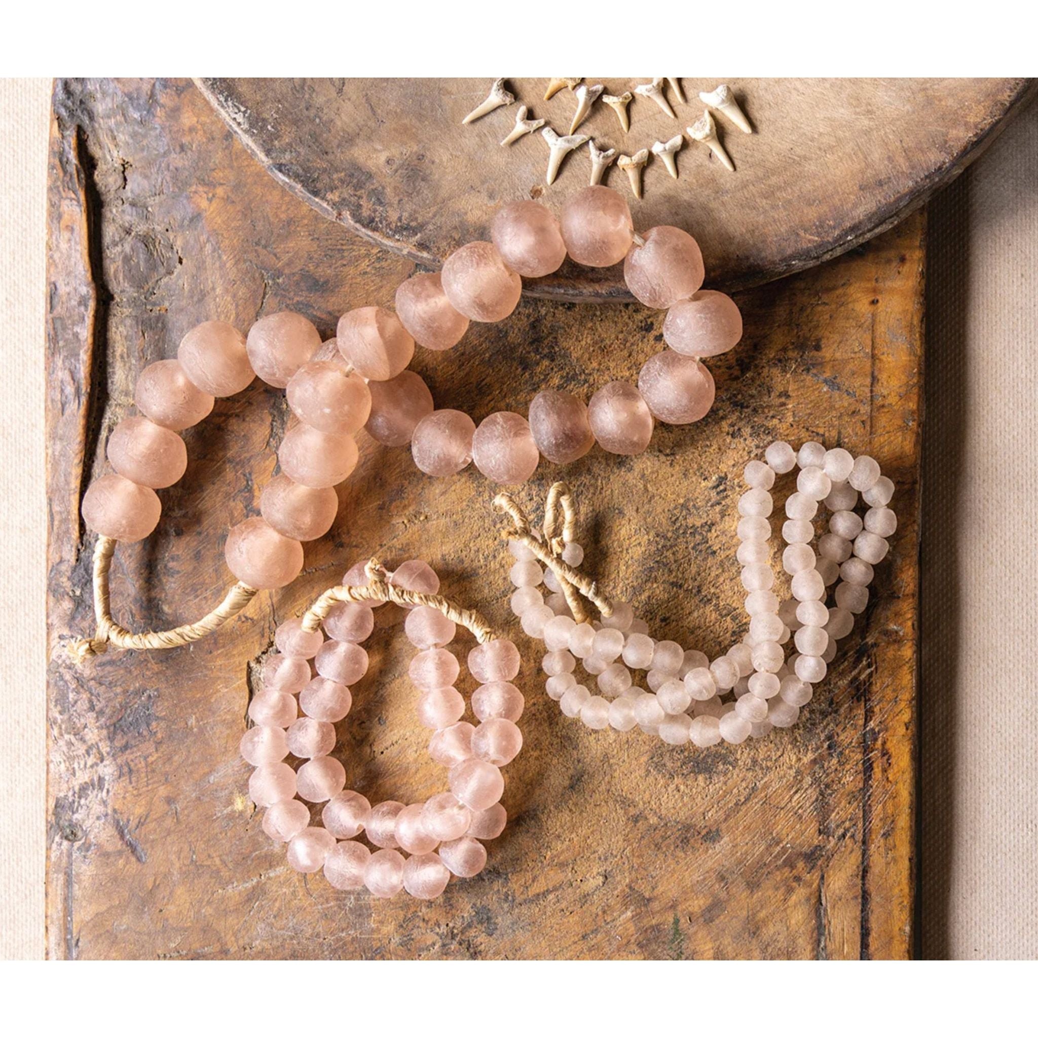 Handcrafted Pink Glass Beads - Sustainable Decor from Recycled Glass