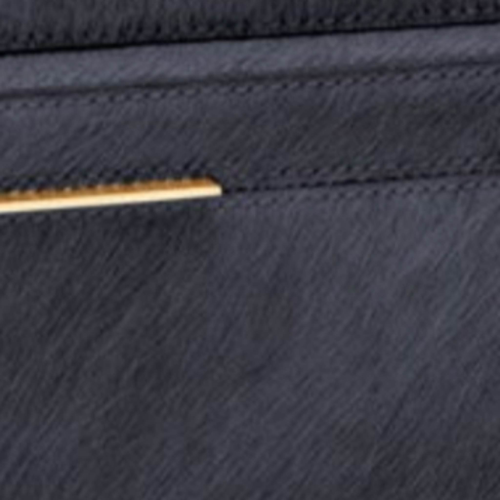 Ralston display box set of two, crafted in rich midnight hair-on-hide with brass-lipped handles; one small and one large decorative storage box.