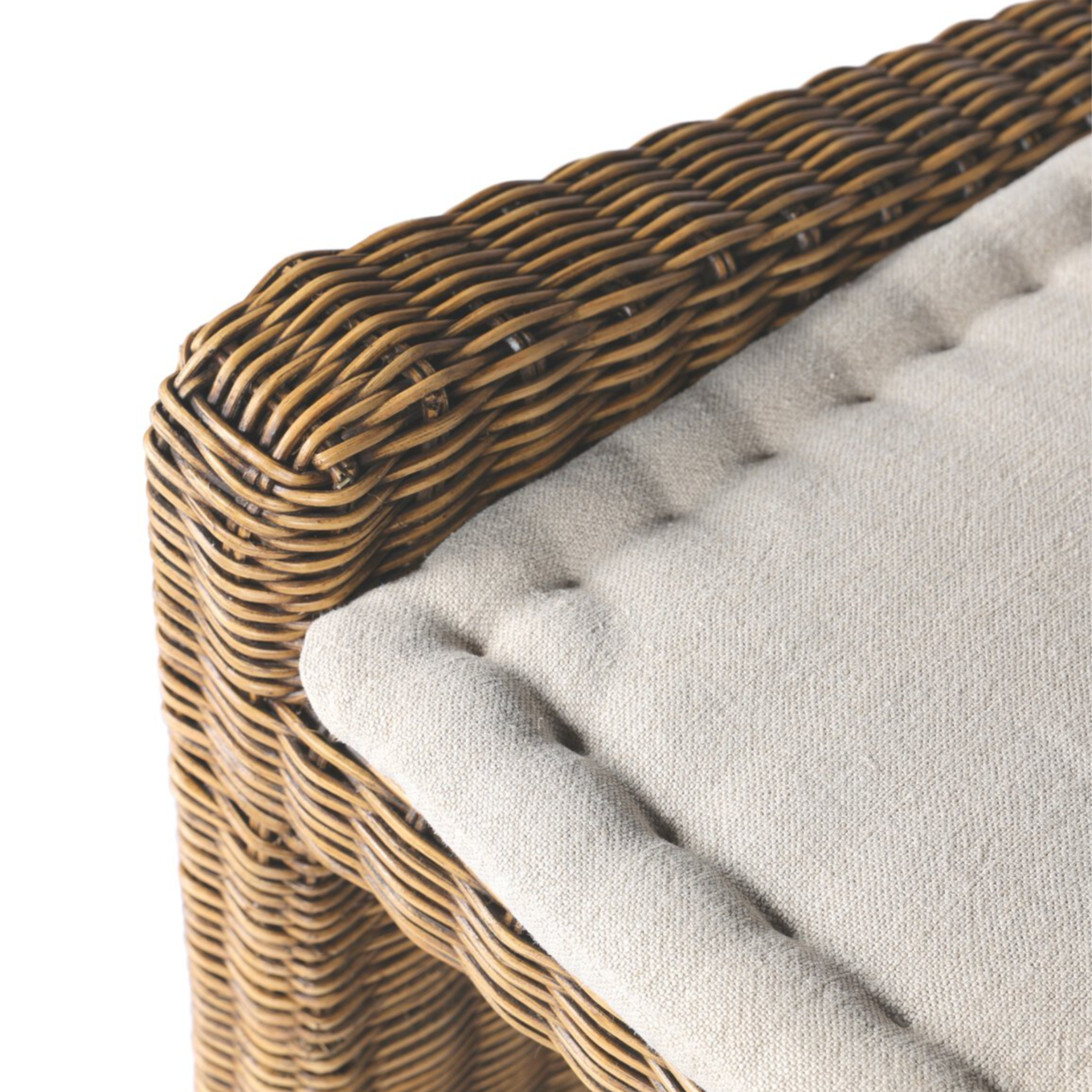 Left arm facing small dining bench with natural woven brown rattan frame and flax/linen cushion in Broadway Dune, 49 inches wide.