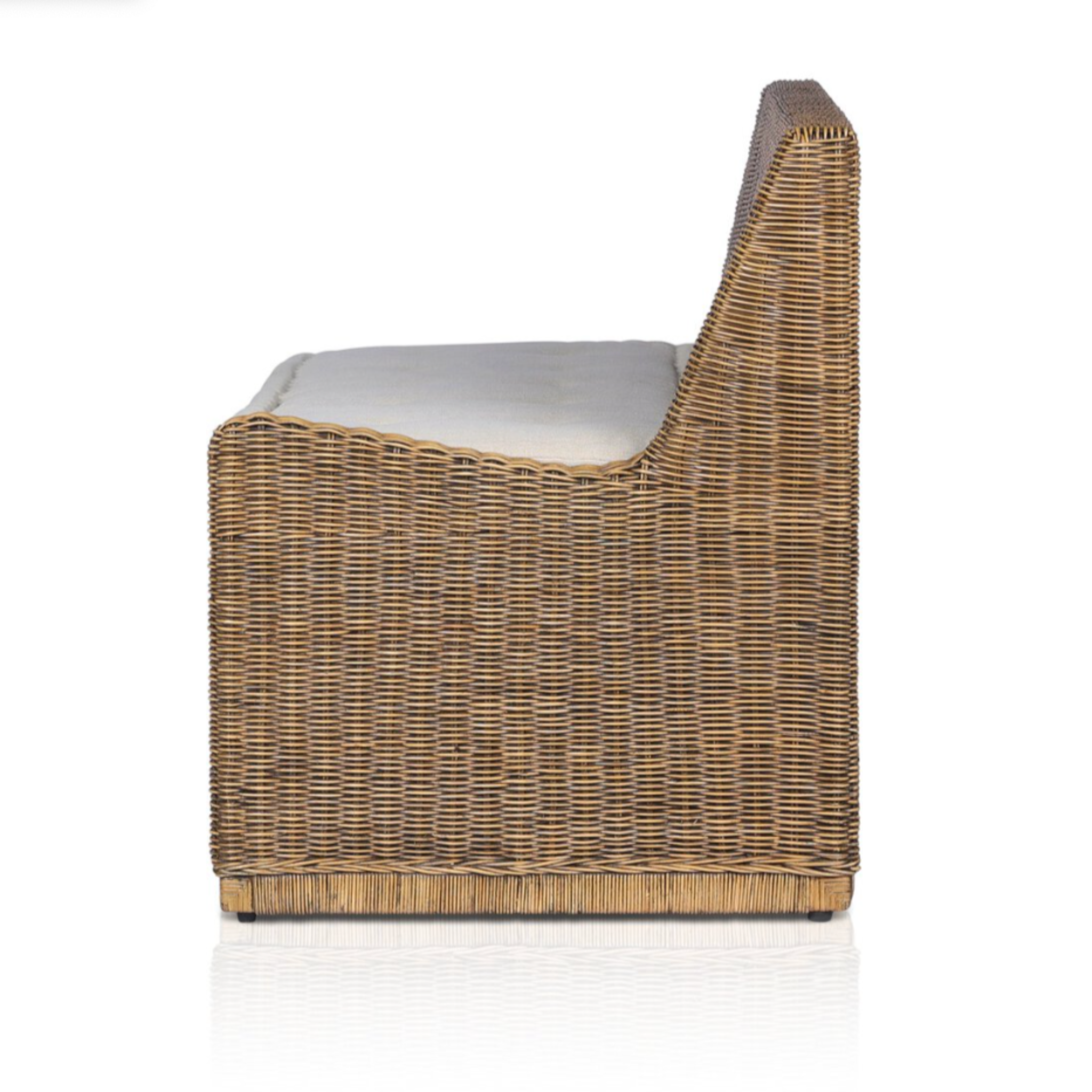 Right arm facing small dining bench with woven natural brown rattan frame and flax/linen cushion in Broadway Dune, 49 inches wide, ideal for casual seating.