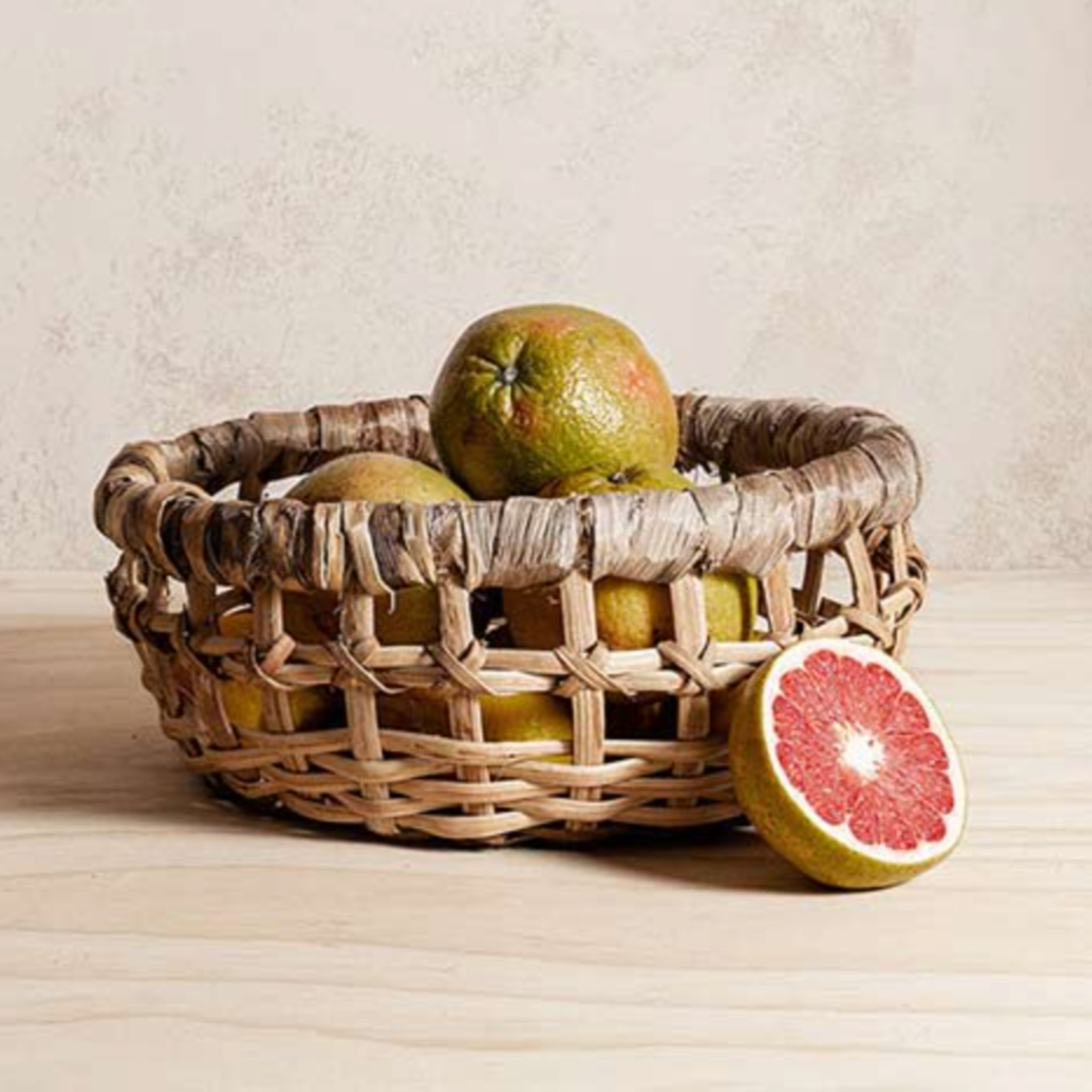 Set of 2 handwoven baskets crafted from natural pepper vine and plantain stalk, handmade by Guatemalan women artisans.