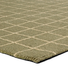 Windowpane Check Rug in olive green with handwoven 2/3-inch pile, durable wool and PET yarn blend, ideal for medium-traffic spaces.