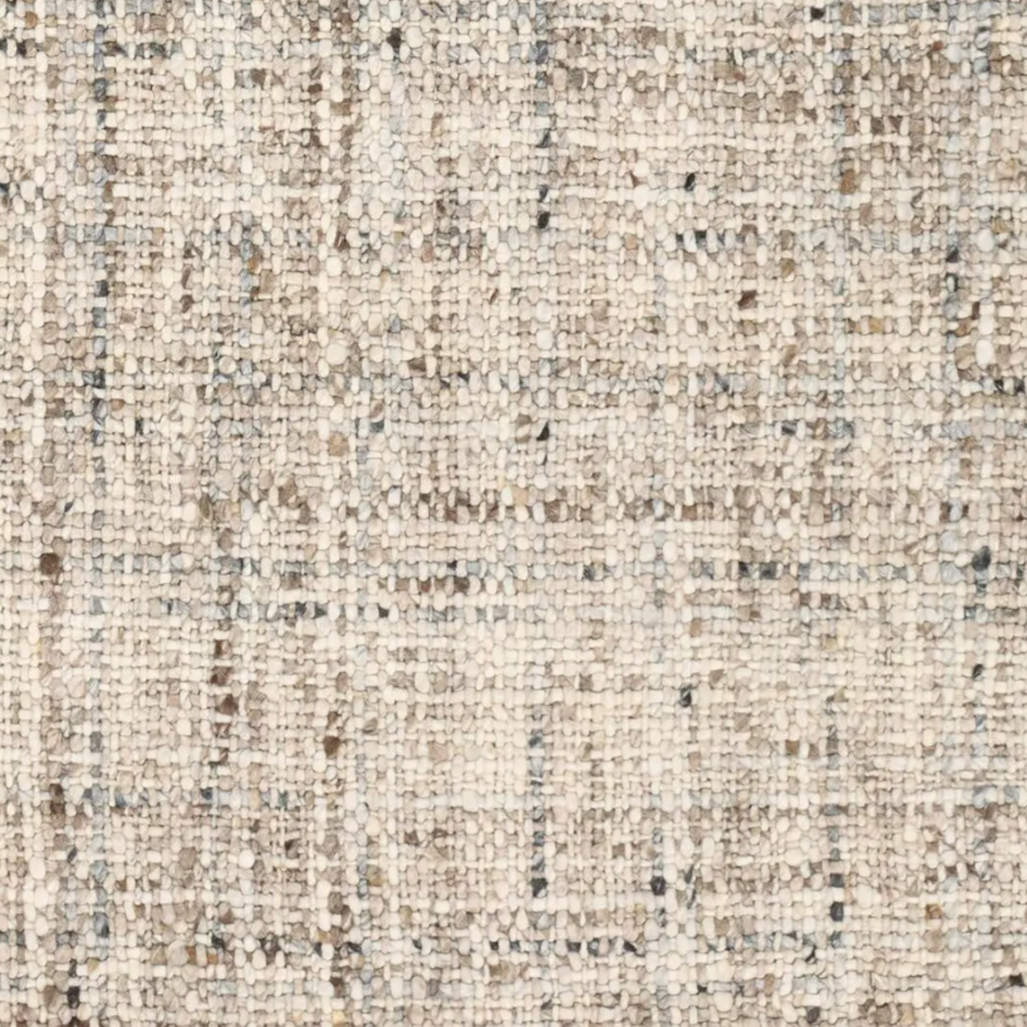 Woven cream, tan, and caramel rug with chunky tweed texture, handwoven wool, 100% cotton backing, ideal for low-traffic spaces.