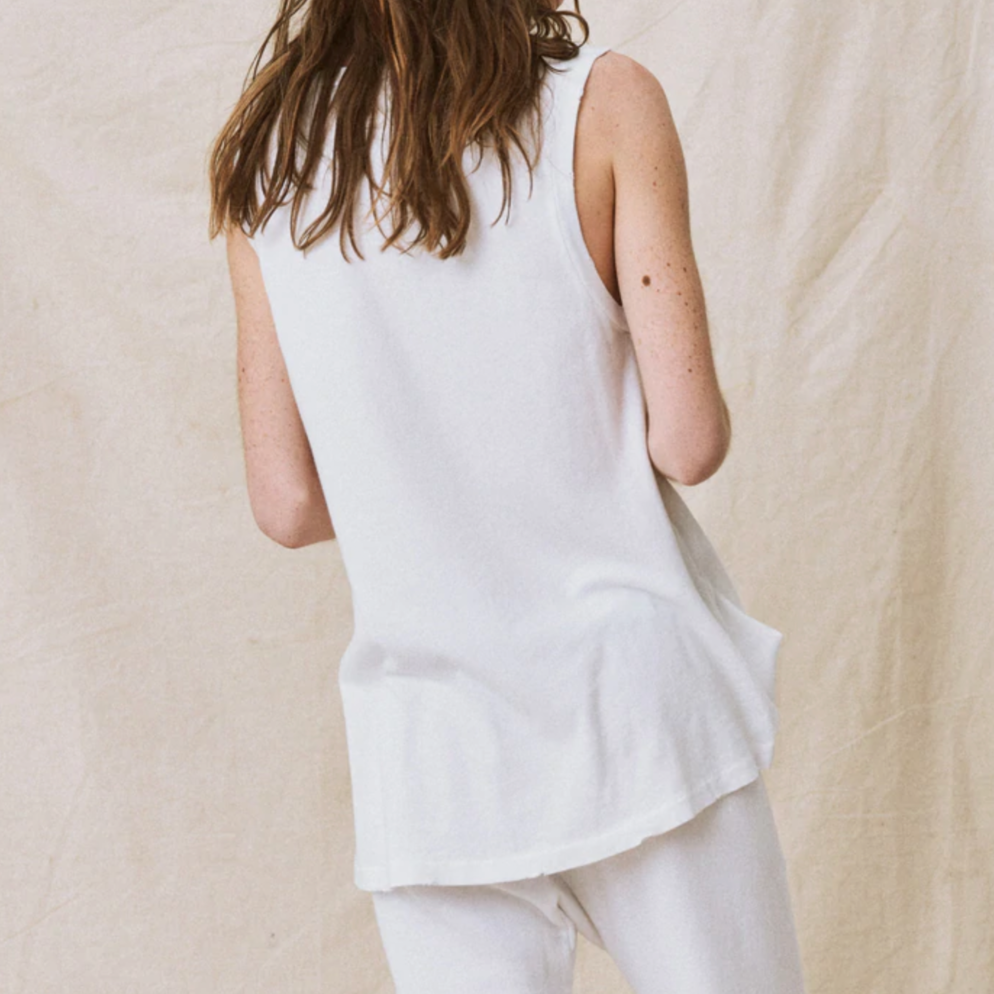 The Great Sleeveless Crew Top in Washed White - Shoppe Details and Design.