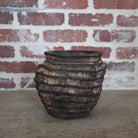 smokey black grooved teak bowl.