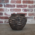 smokey black grooved teak bowl.