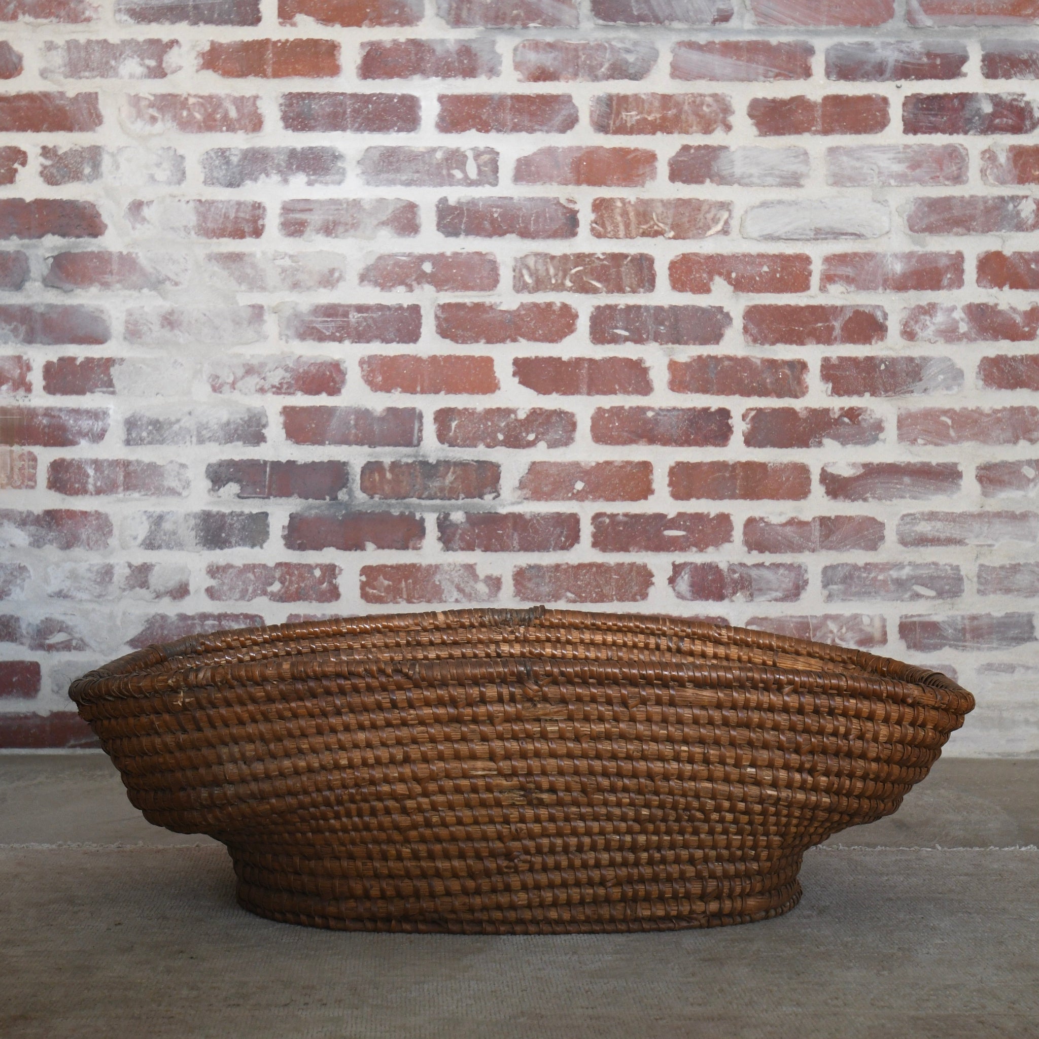 20th century french woven oval basket.