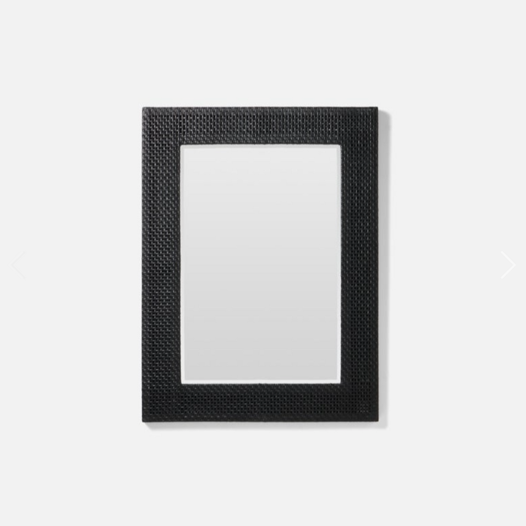 Elegant Isla Mirror with onyx peeled rattan frame.