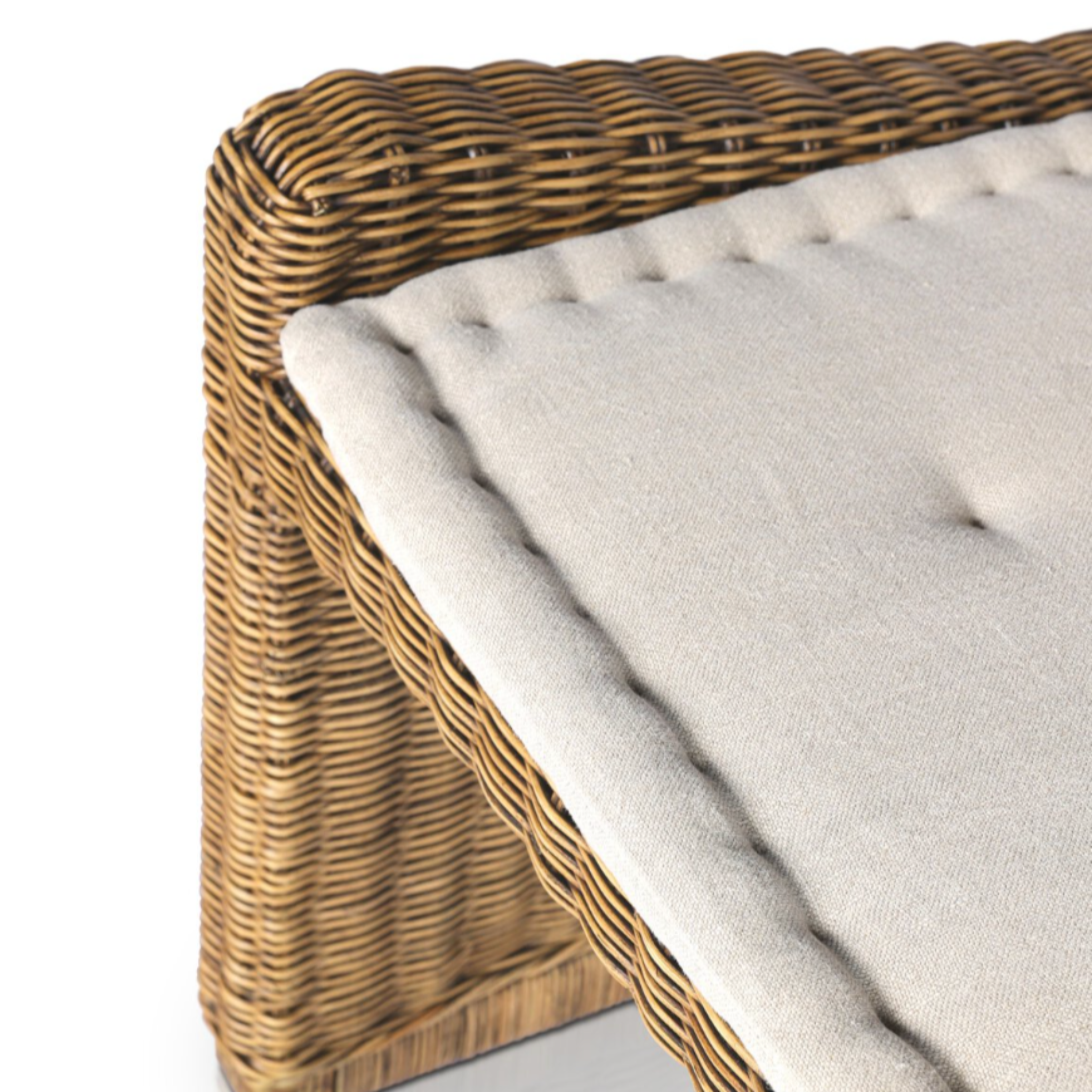 rattan left arm facing large dining bench.
