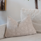 Adeyemi Indian hand block lumbar pillow featuring artisan linen pattern front, oatmeal canvas back, hidden zipper, and soft feather-down fill.