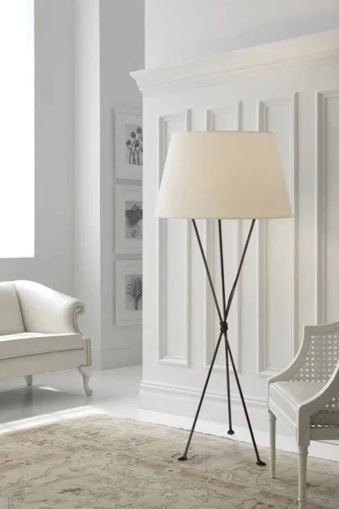 "Aerin's Lebon Brass Glide Luxury Floor Lamp in a modern living room"