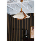 "Antique Hanging Woven Wood Pendant Light illuminating a rustic living room"