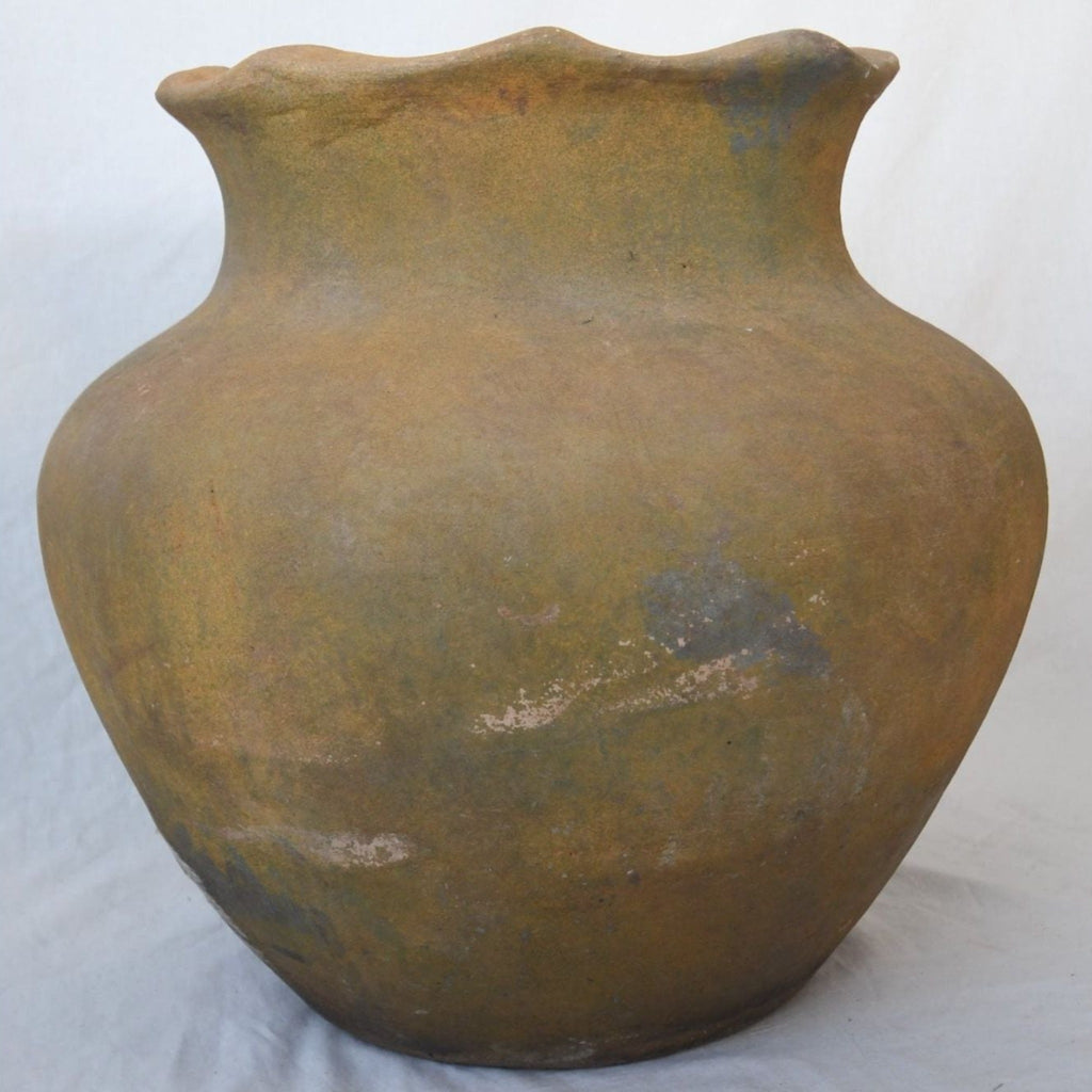 "Small Antique Mexican Pottery displayed on a rustic wooden shelf"