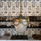 Vintage Antique Pendant illuminating a dining area with old-world charm"