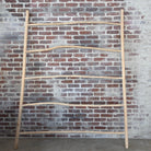 Versatile Antique Ladder used as a towel holder