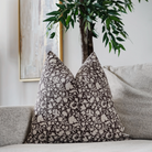 Bayo Indian hand block pillow featuring an artisan linen pattern front, oatmeal canvas back, hidden zipper, and plush feather-down fill for cozy, unique decor.