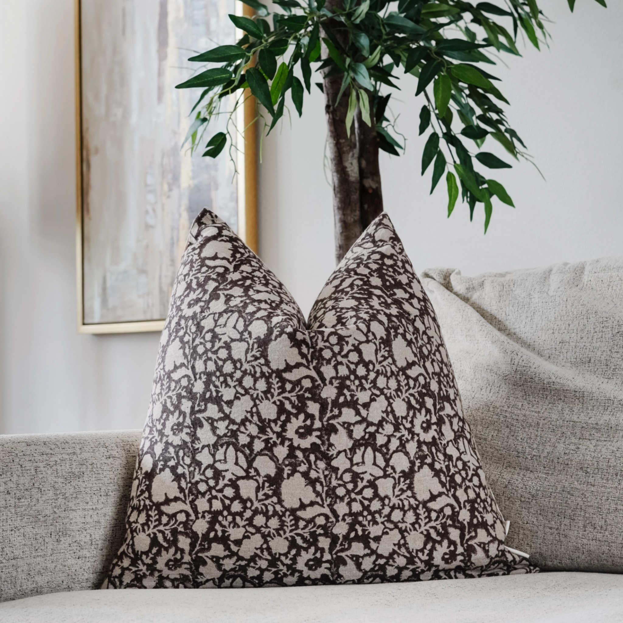 Bayo Indian hand block pillow featuring an artisan linen pattern front, oatmeal canvas back, hidden zipper, and plush feather-down fill for cozy, unique decor.