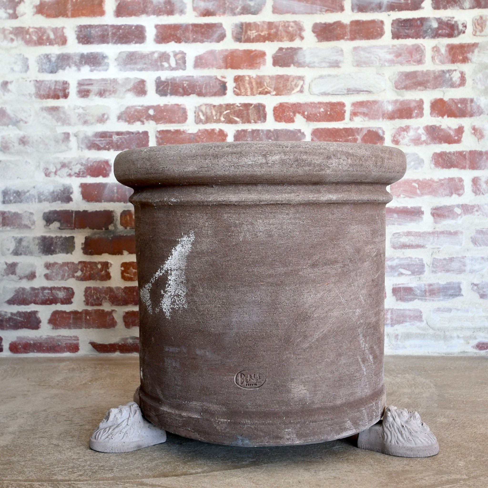 XL ceramic planter with three lion head feet, designed in Denmark and handcrafted in Tuscany for durability, drainage, and outdoor use.