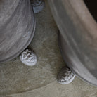 Bergs XL Potter ceramic planter with three lion head feet, designed in Denmark and handcrafted in Tuscany, outdoor-ready, durable, and stylish for gardens.