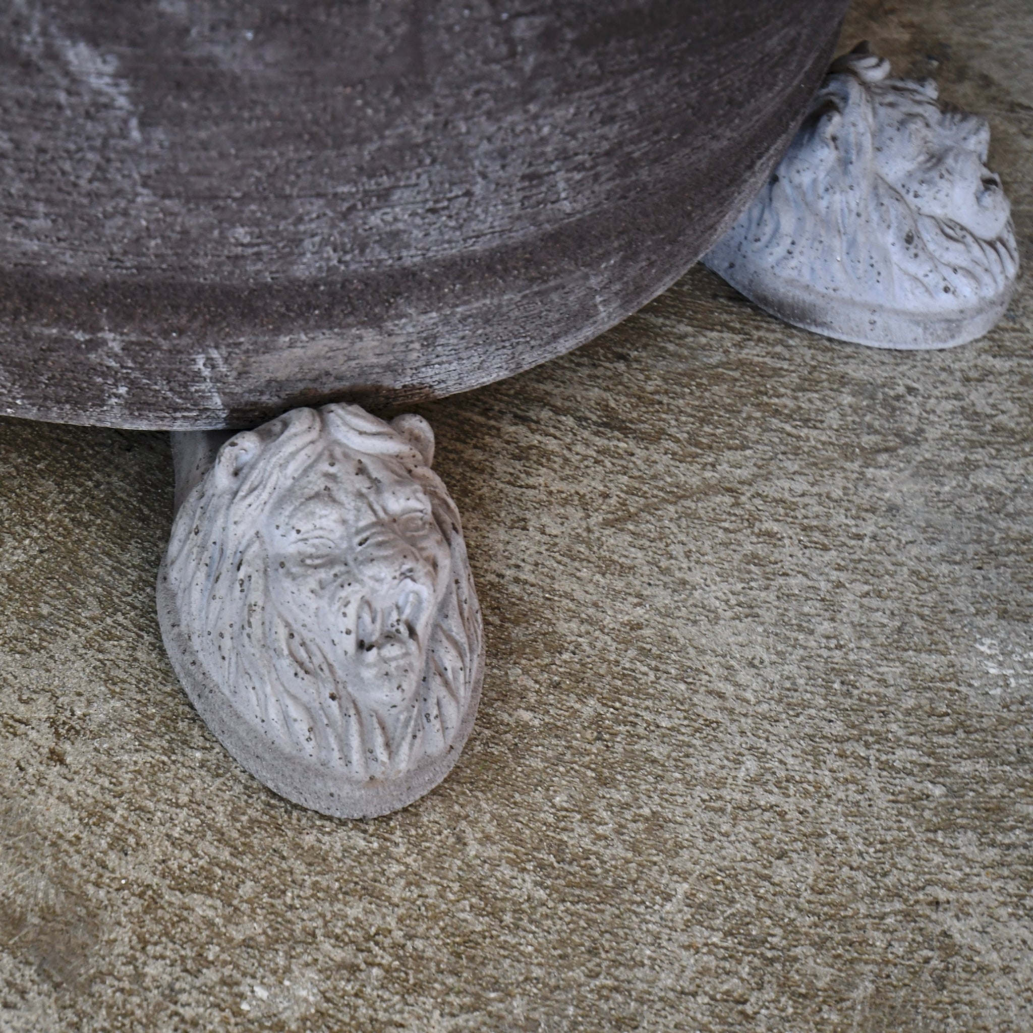 Bergs XL Potter ceramic planter with three lion head feet, designed in Denmark and handcrafted in Tuscany, outdoor-ready, durable, and stylish for gardens.
