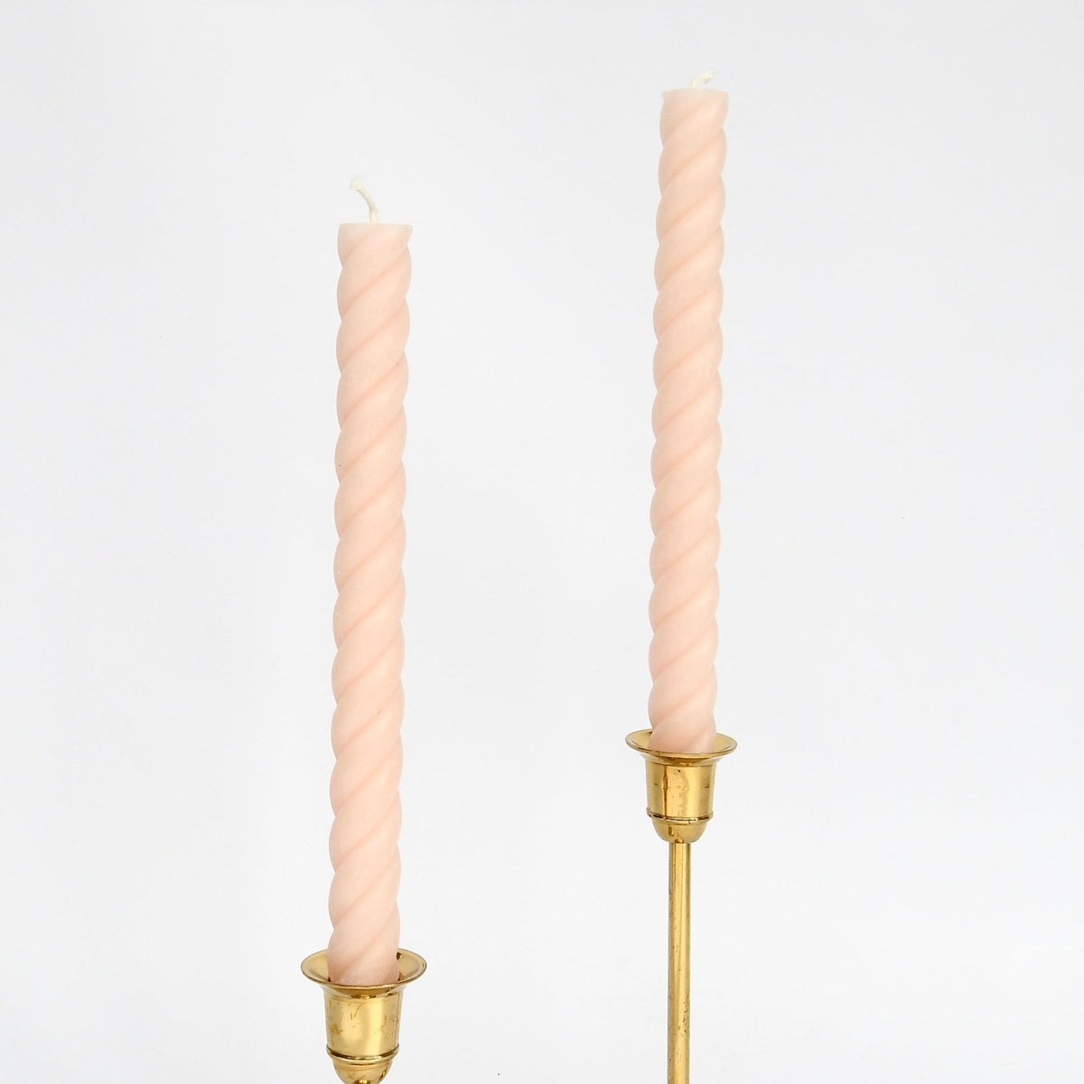 blush 10" twisted rope taper candle, hand-poured from pure beeswax in New York, burn clean and bright.