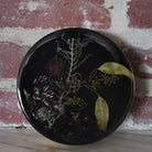 botanical resin art brass and black wall art.