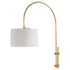 Sleek Brass Arc Lamp with elegant fabric shade.