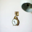 classic brass hook with brass screws.