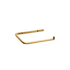 Gold metal brass toilet paper holder.