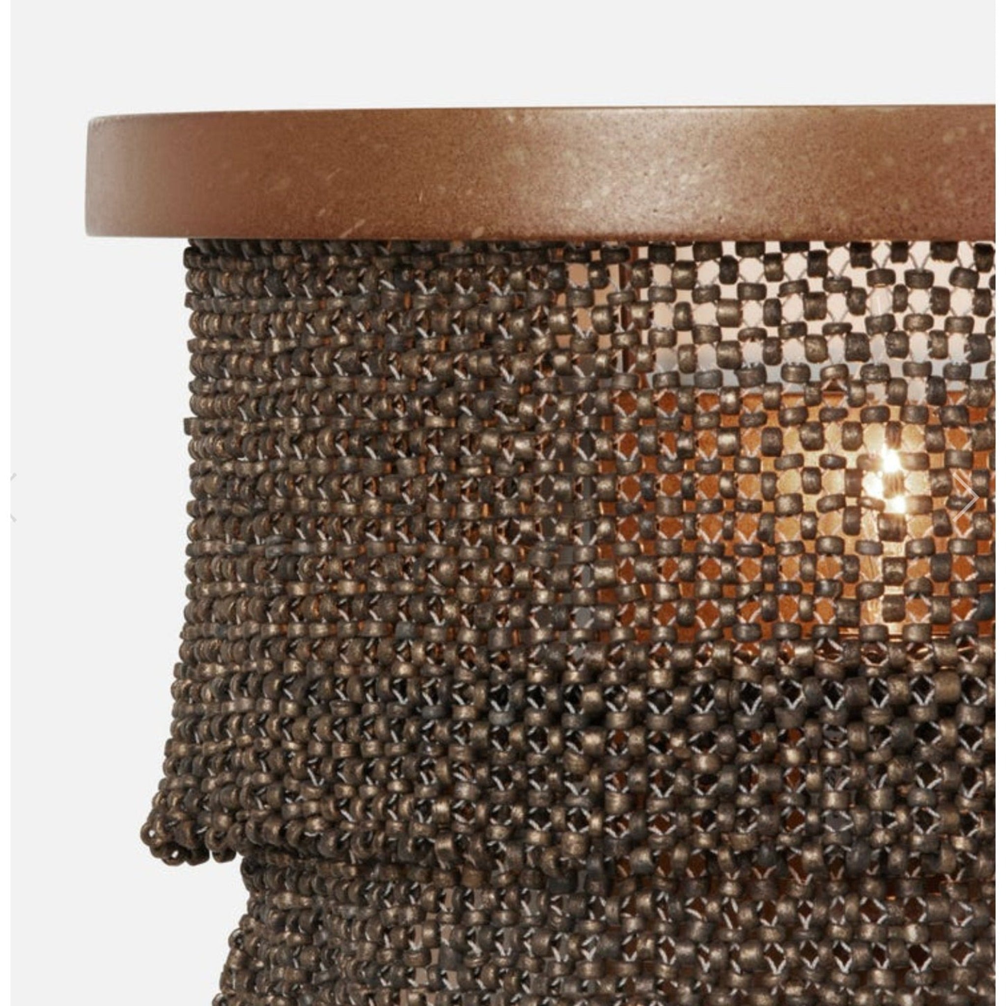 Glamorous bronze and gold wall sconce with coco beads.