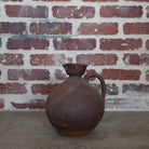 brown ceramic chinese wine bottle.