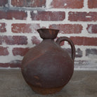 brown ceramic chinese wine bottle.