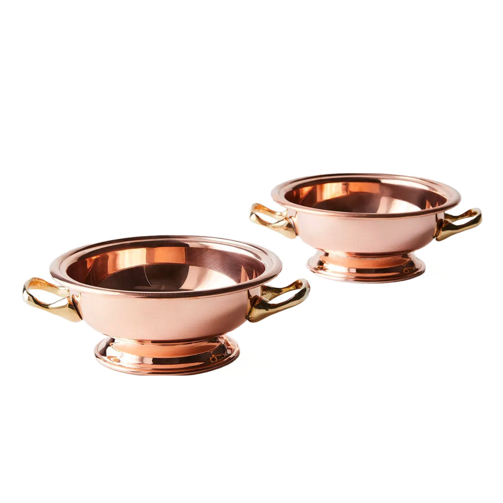 Set of 2 vintage inspired copper bowls on a rustic table