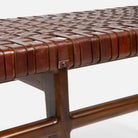 Chestnut woven leather bench.