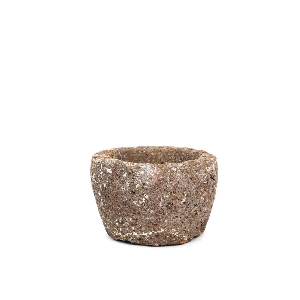 An ancient, timelessly chic Golden Oldies Decorative Antique Stone Bowl isolated on a white background.