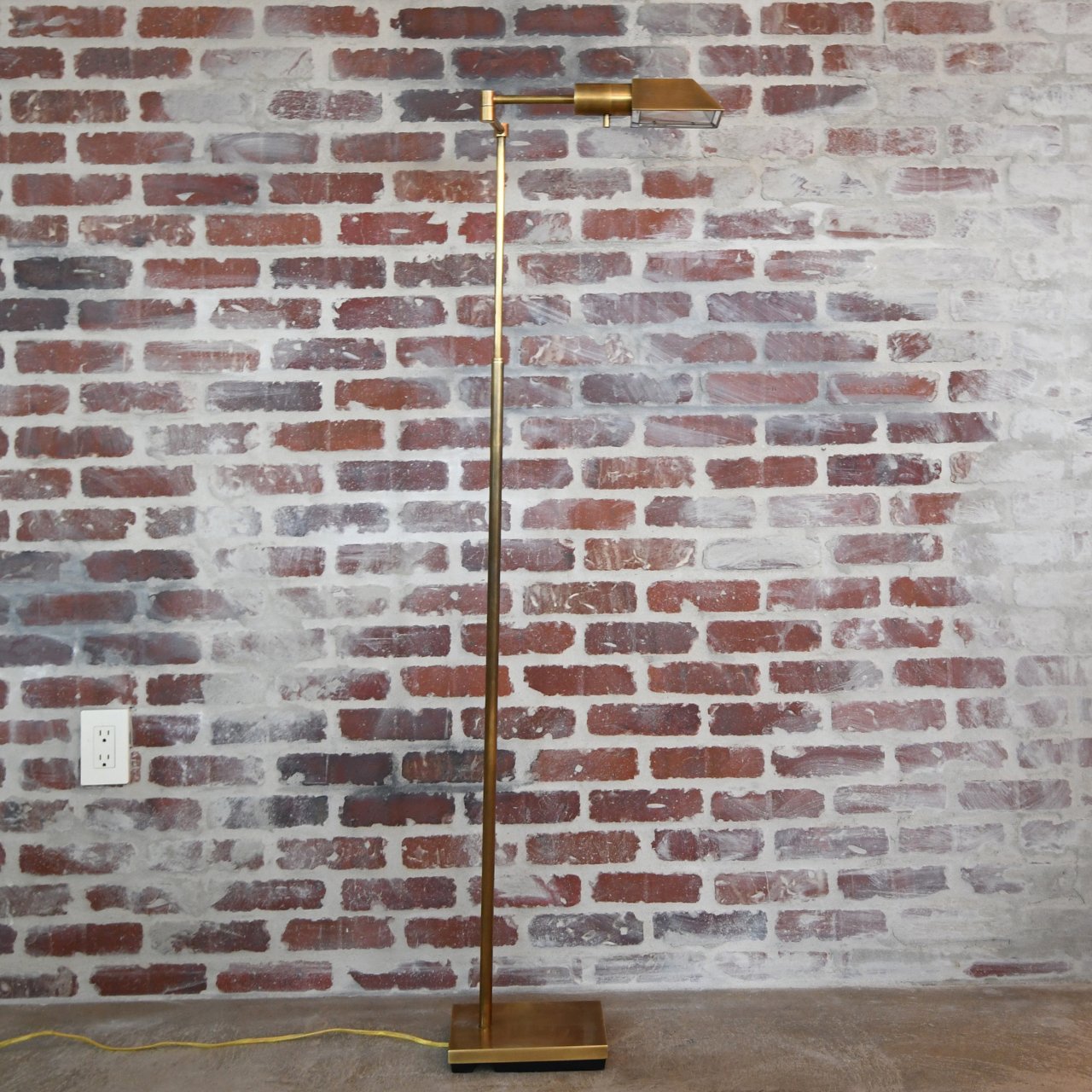 "Antique Brass Floor Reading Lamp beside a cozy armchair"