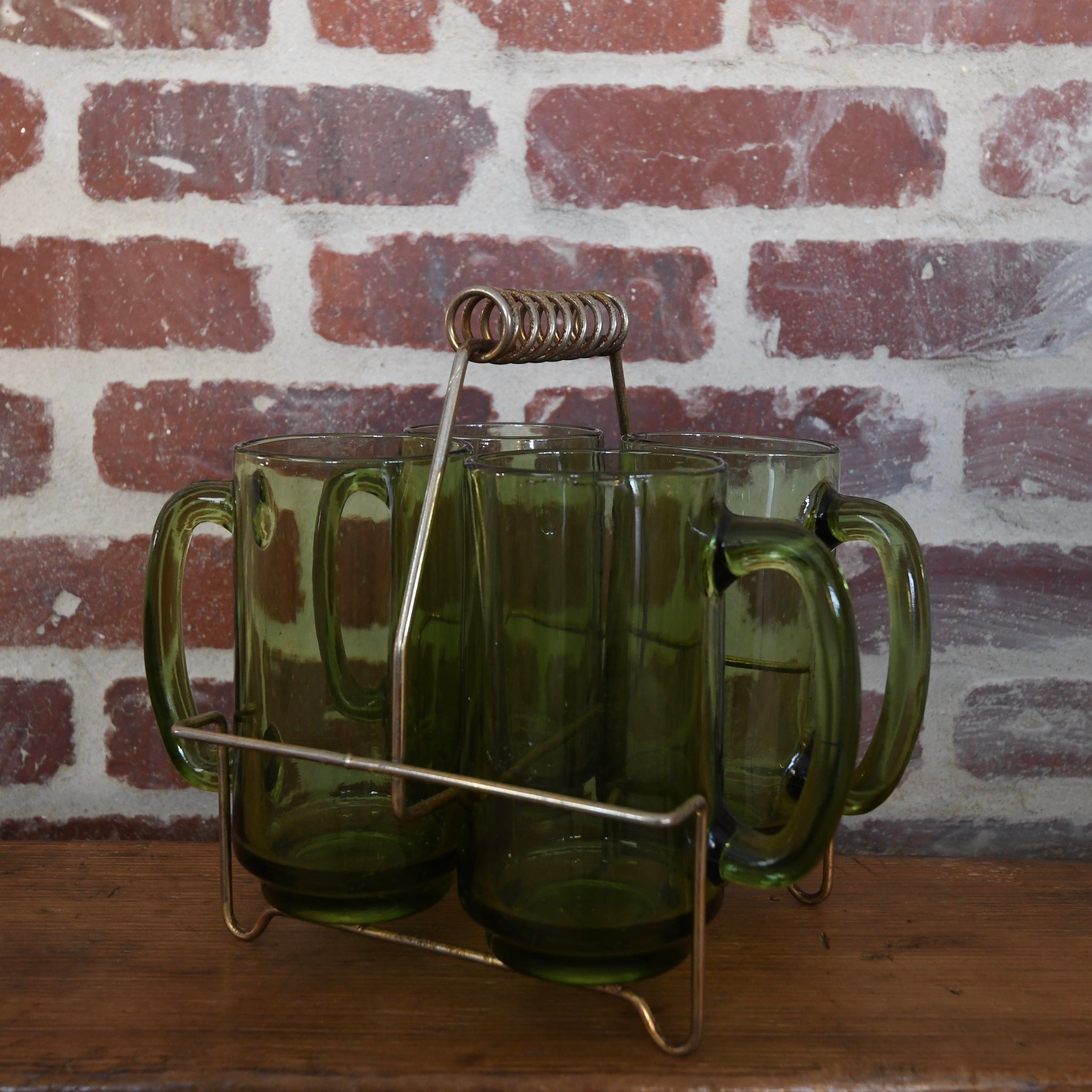 green glass mug set with holder.