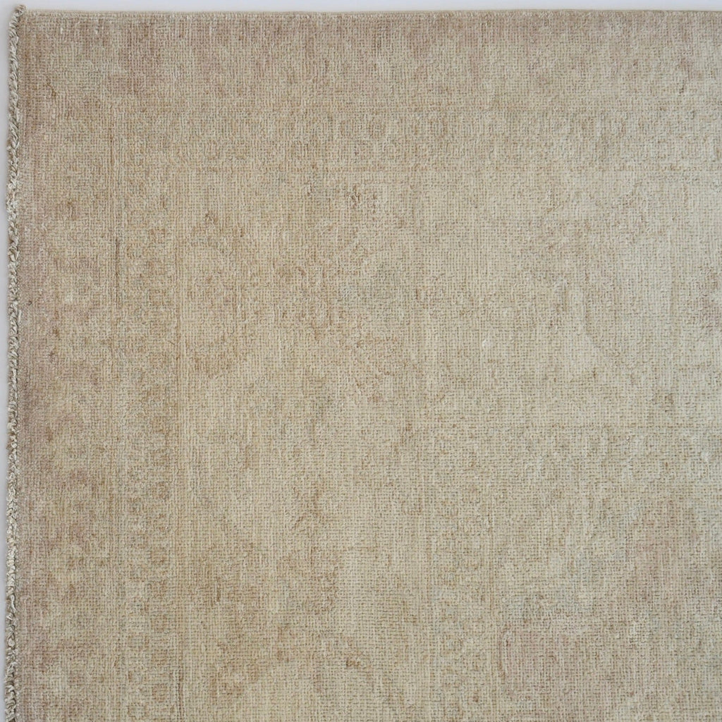 Hand-Knotted Blush Rug showcasing intricate craftsmanship