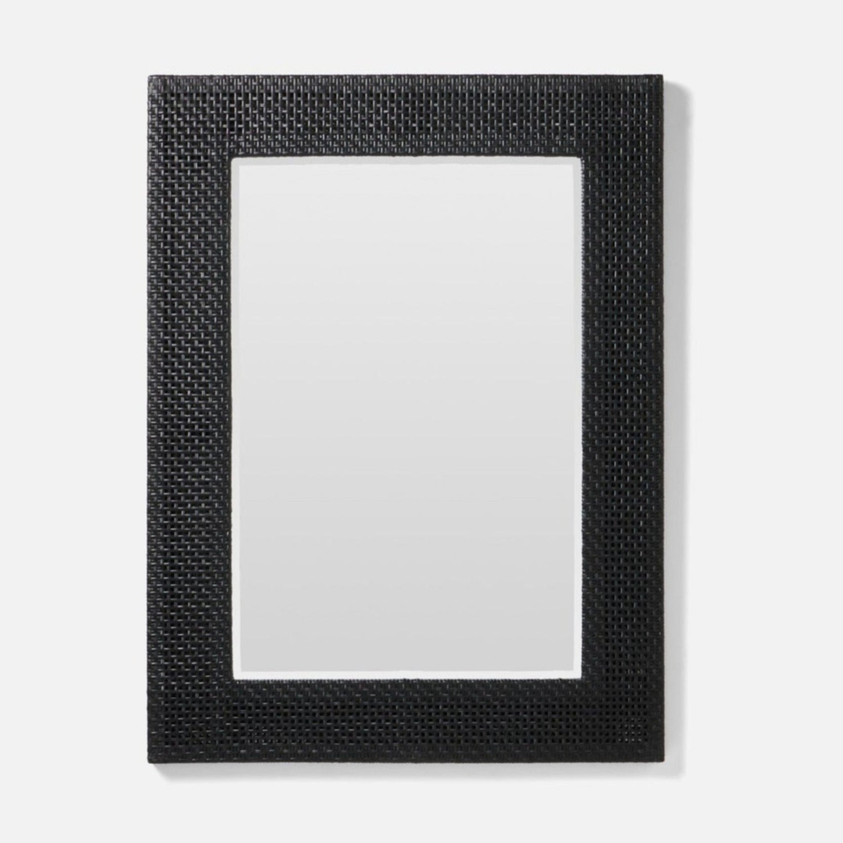 Black Isla Mirror with rattan frame and beveled edge.